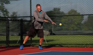 A person playing pickleball