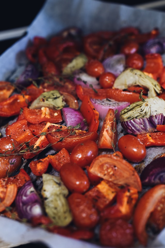 Roasted vegetables on a baking sheet