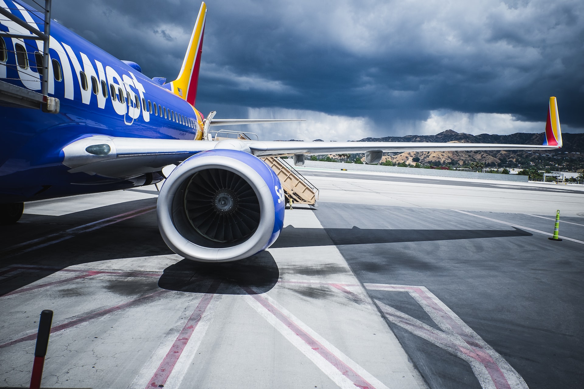 Southwest Airlines plane on the tarmac in a storm.