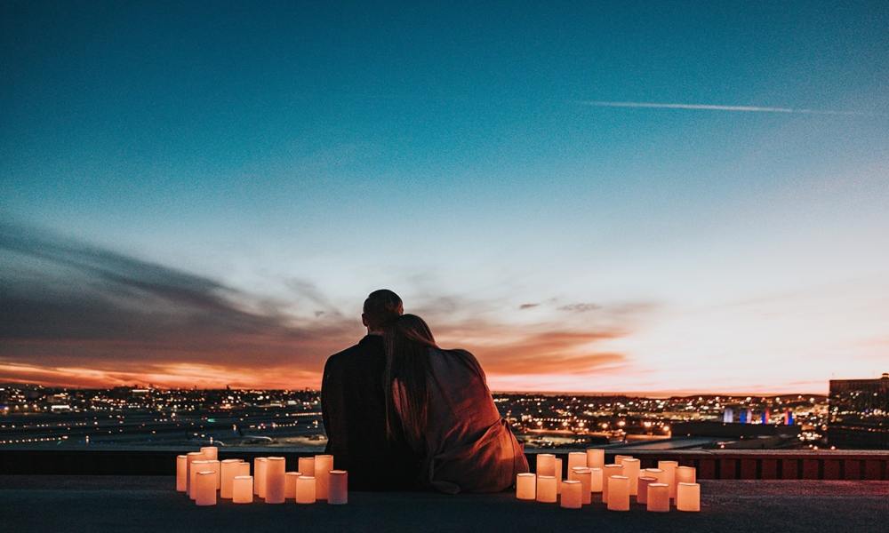 Couple watching the sunset together