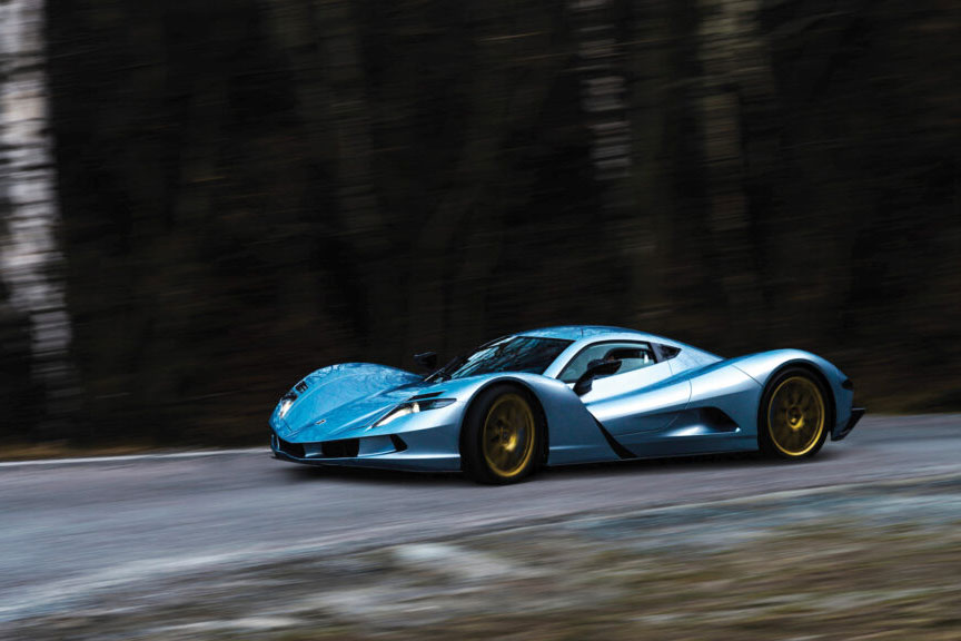 Aspark Owl Japanese electric hypercar on a racetrack.