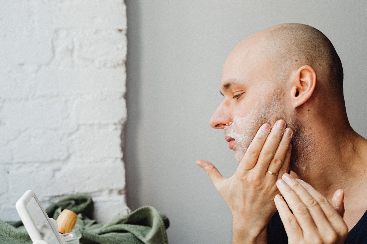 a man massaging his face