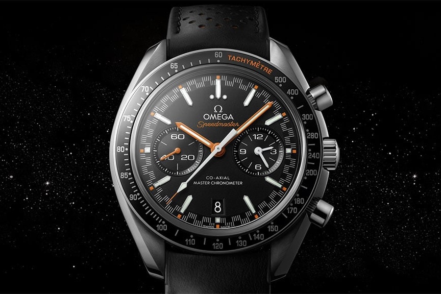 Omega Speedmaster Racing watch floating in space with stars in the background.