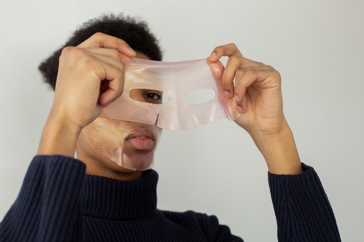 Man using skincare mask