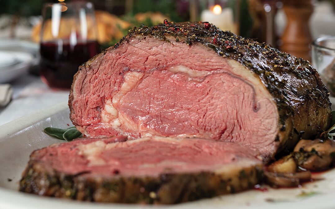 Dijon-herb prime rib roast with garlic butter mushrooms from Omaha Steaks