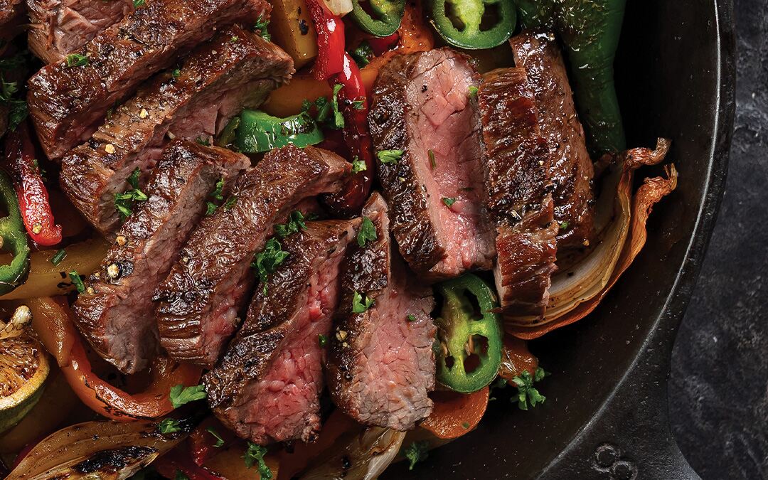 Grilled bavette steak fajitas with grilled tortillas from Omaha Steaks