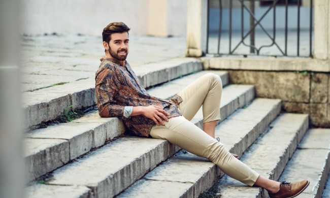 Man in Khaki pants laying on steps