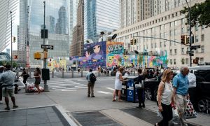 A busy city street with people everywhere