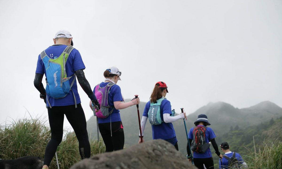 A group of people hiking outside.