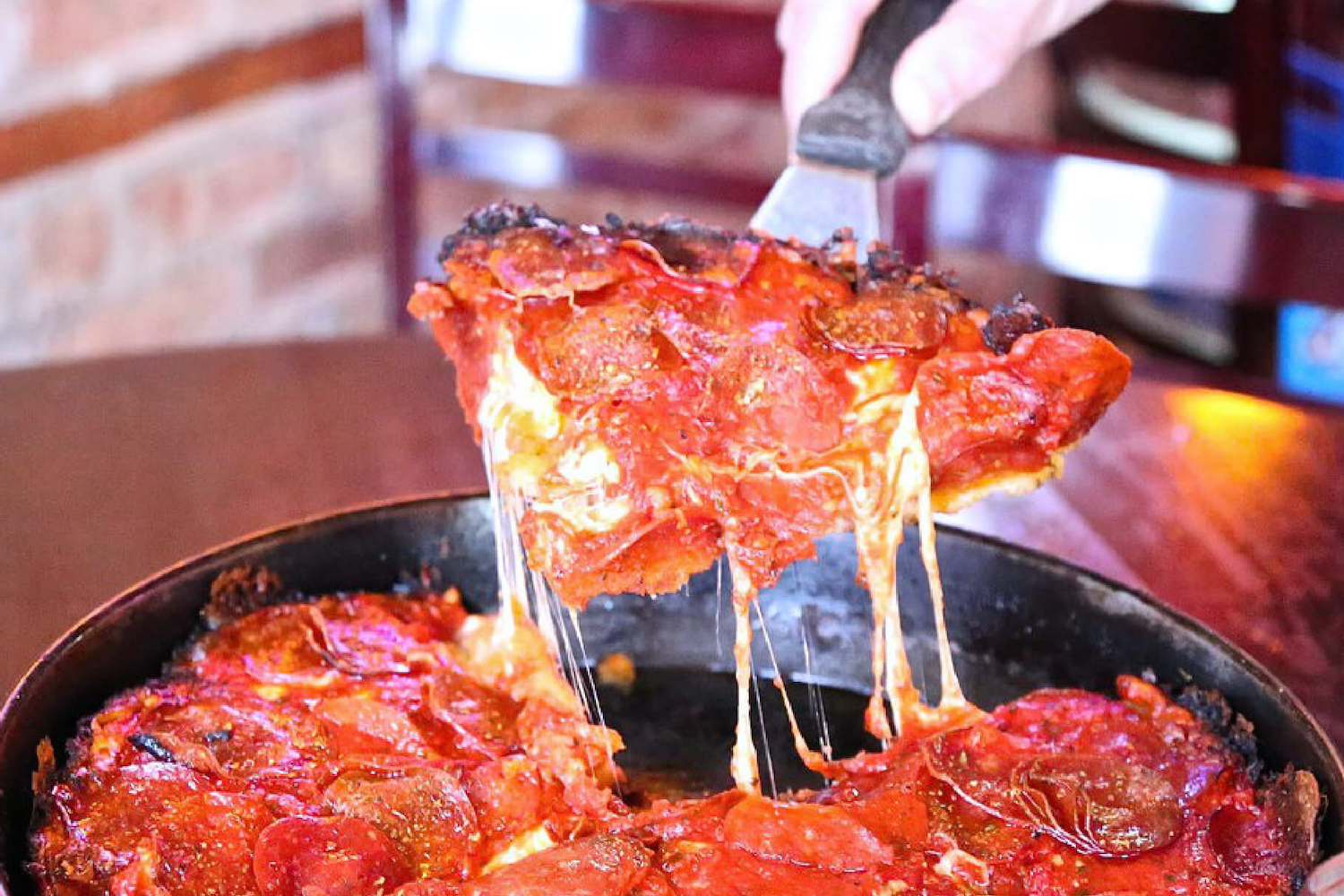 A slice from Pequod's in Chicago.