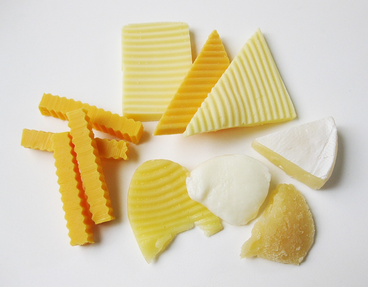 Assorted sliced cheeses