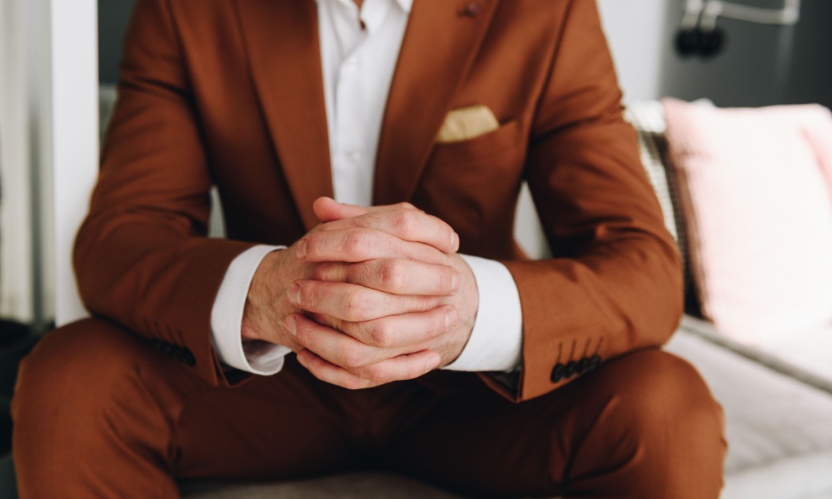 Man in a brown suit