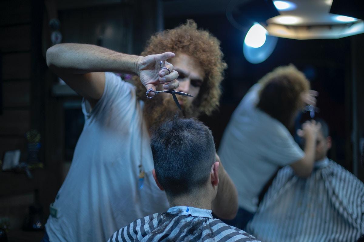 a man getting his haircut