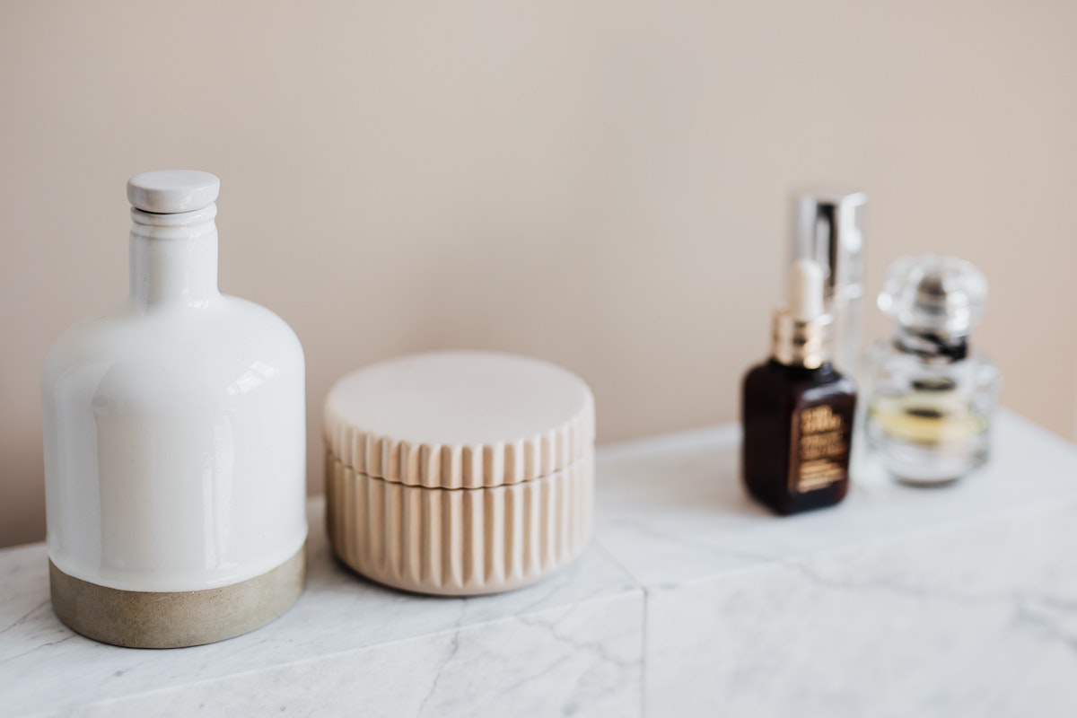 skincare products on a white marble counter