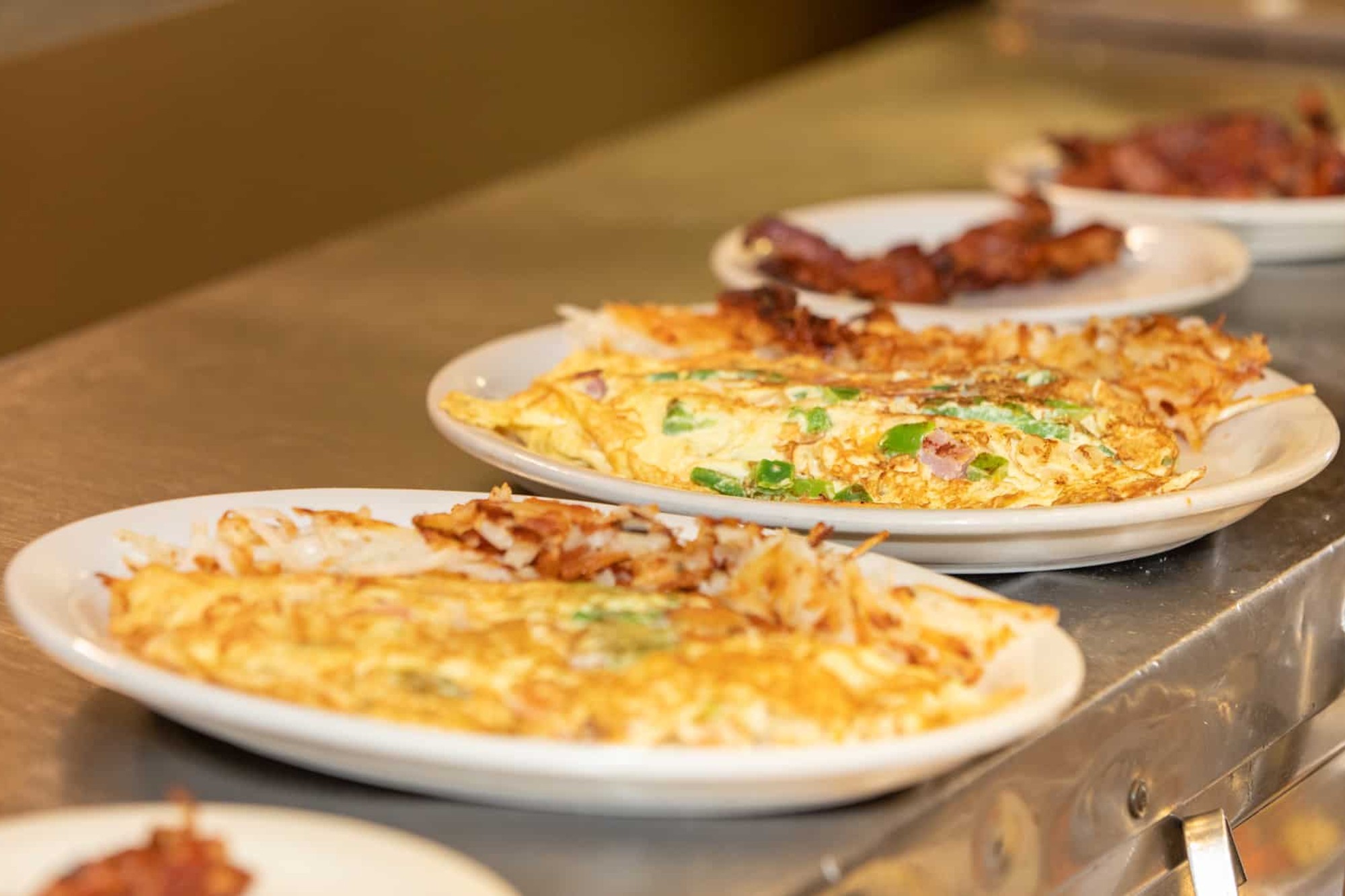 The omelets being plated at Coffee Pot Restaurant in Sedona, Arizona.