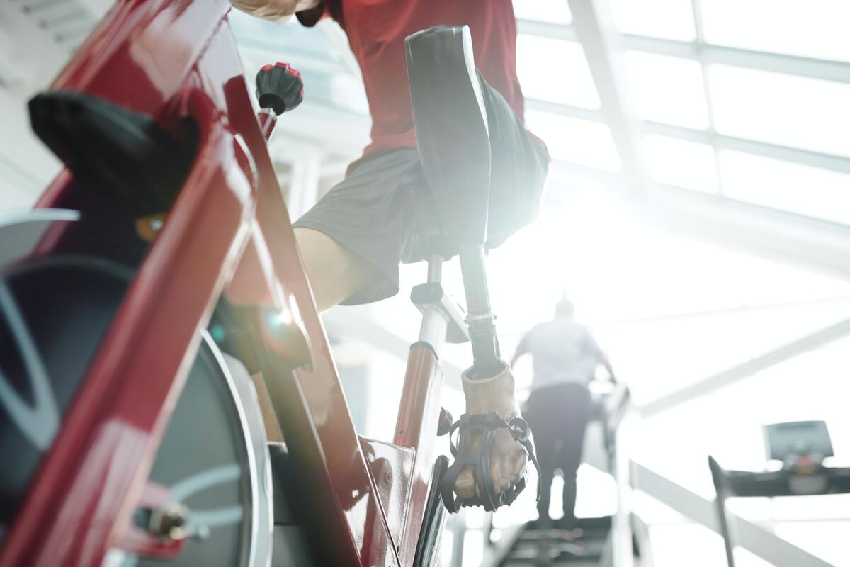 Man riding stationary bike