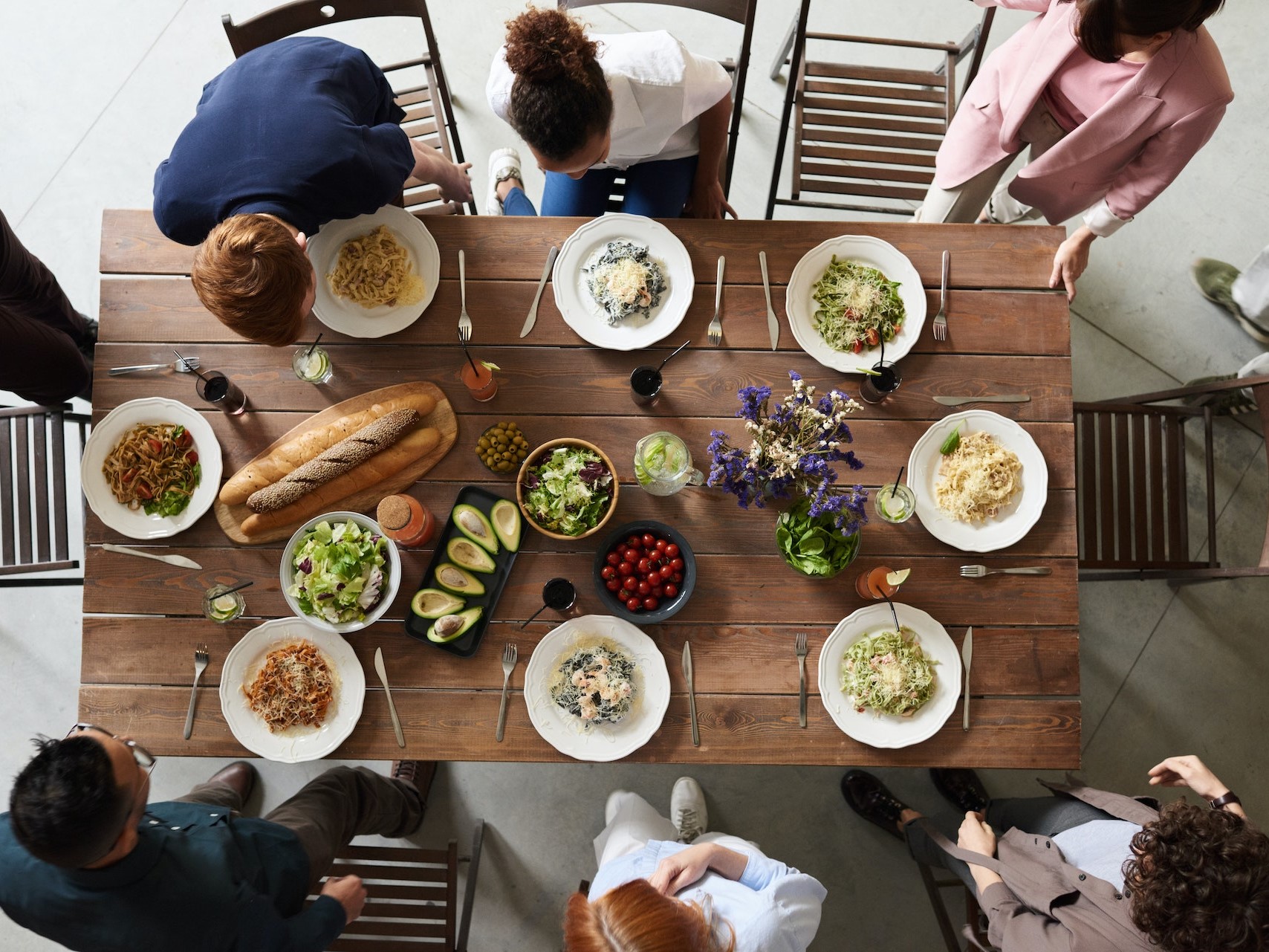 Family about to eat dinner.