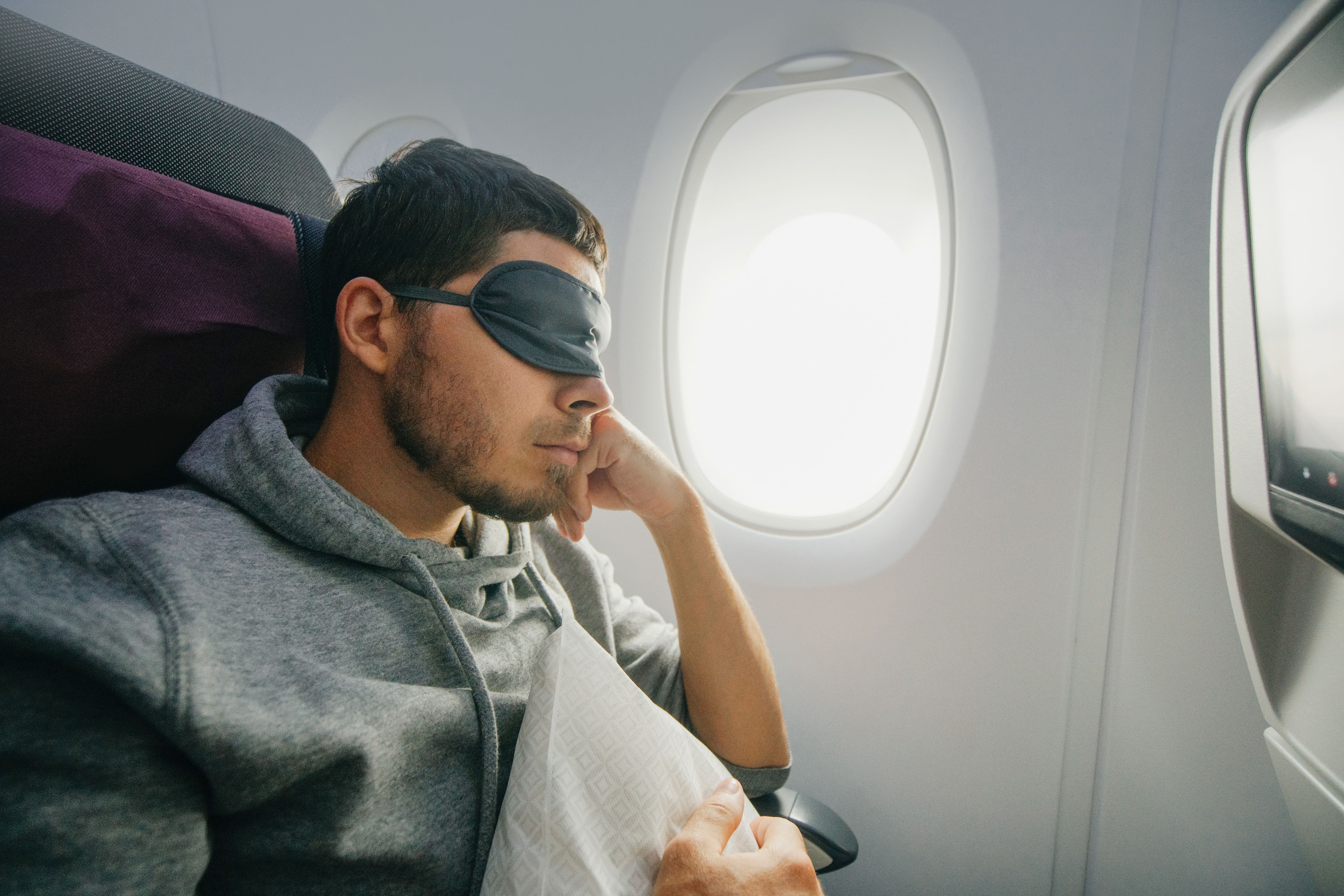 Man In Eye Mask Sleeps On Plane ?fit=800%2C533&p=1