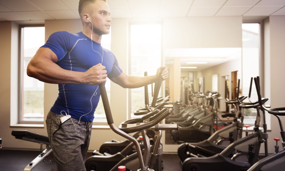 Man on an elliptical.