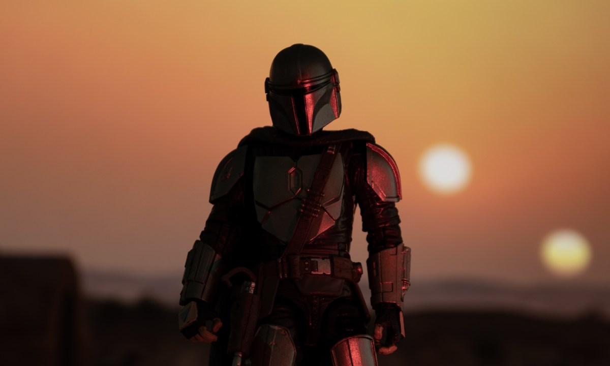 The Mandalorian looks out over the sun