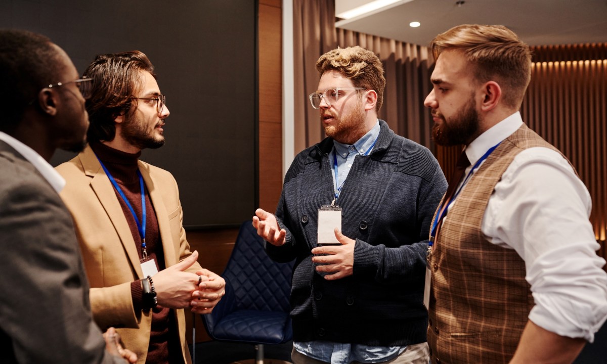 Men standing together and talking