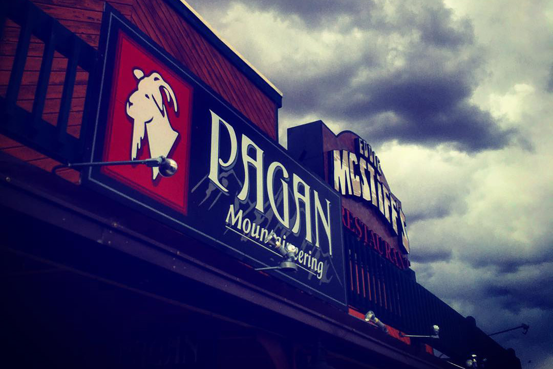 Sign over the front entrance at Pagan Mountaineering in Moab, Utah.