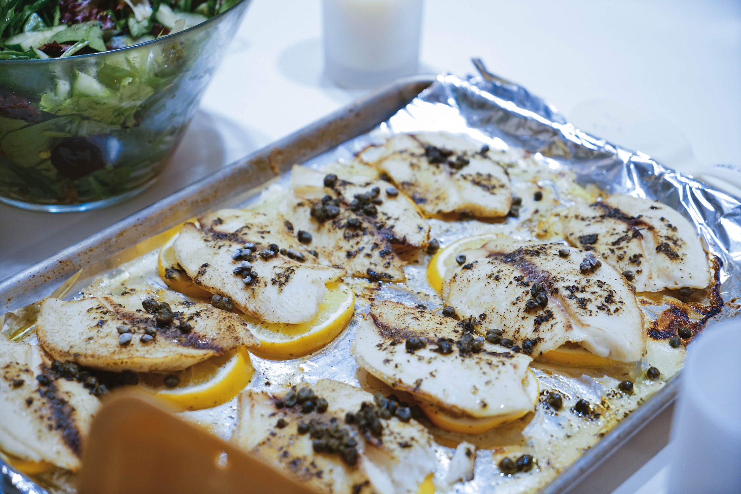 Sheet pan fish with lemon and capers