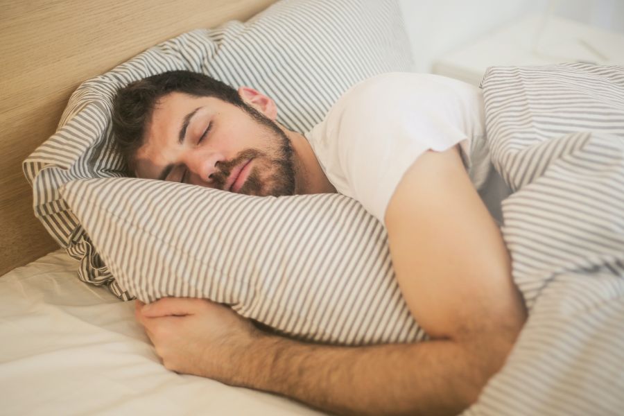 Man sleeping in t-shirt