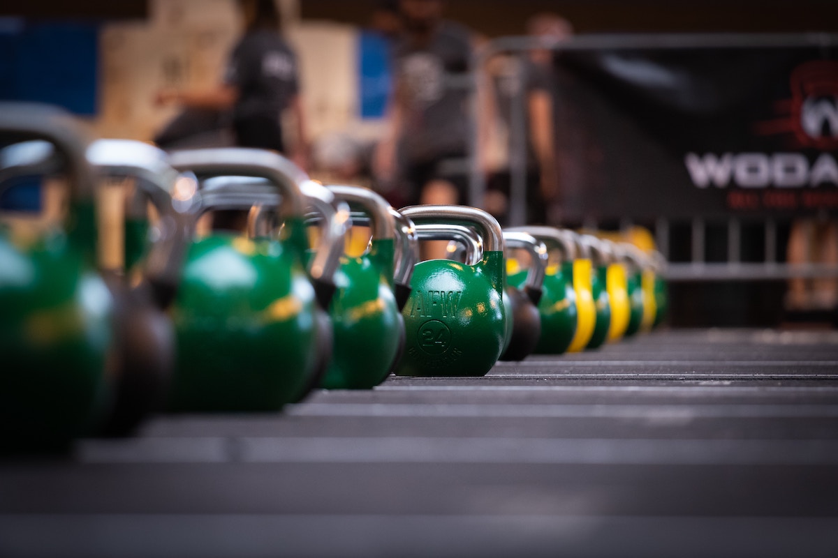 Green kettlebells at the gym