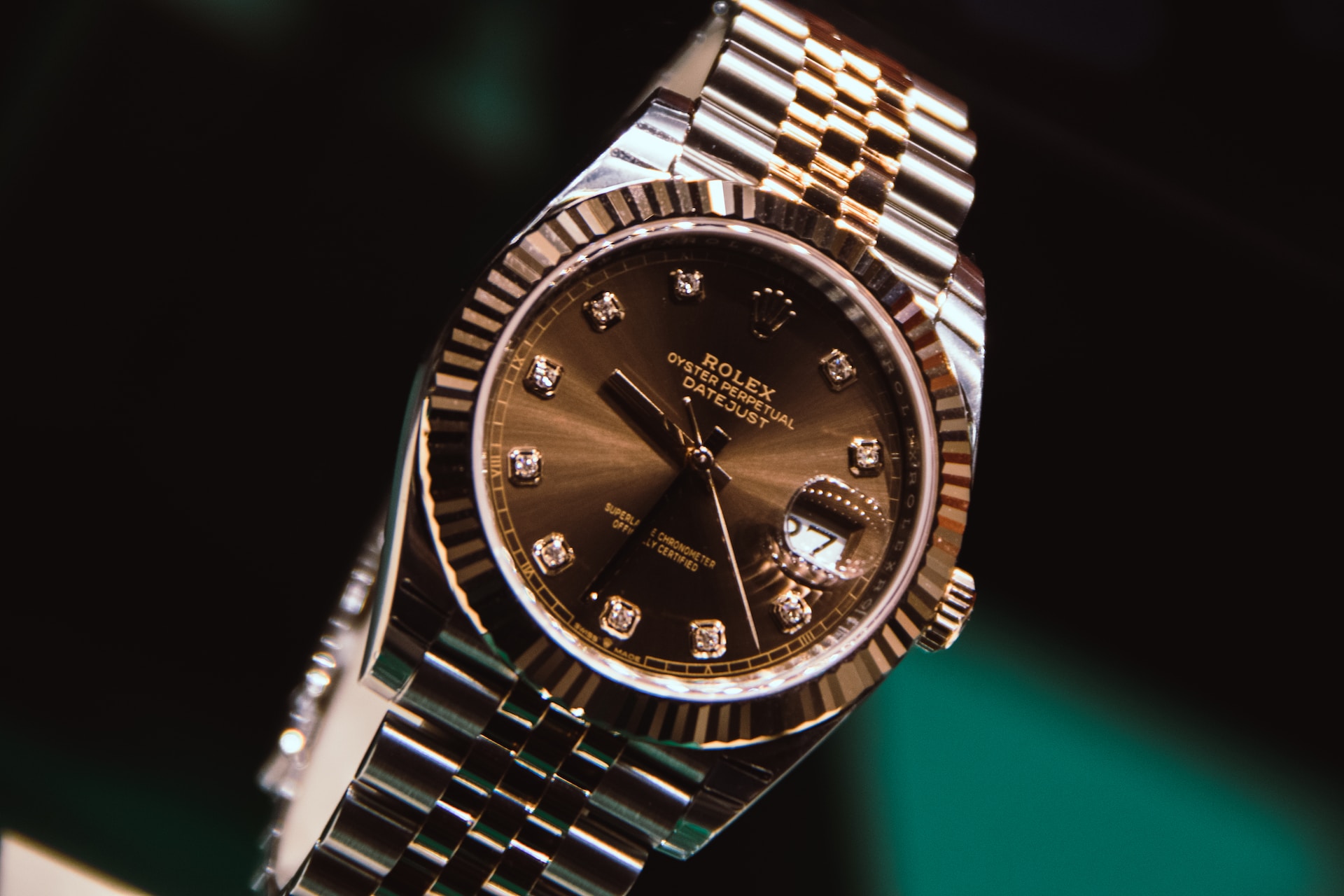 A brown Rolex watch.