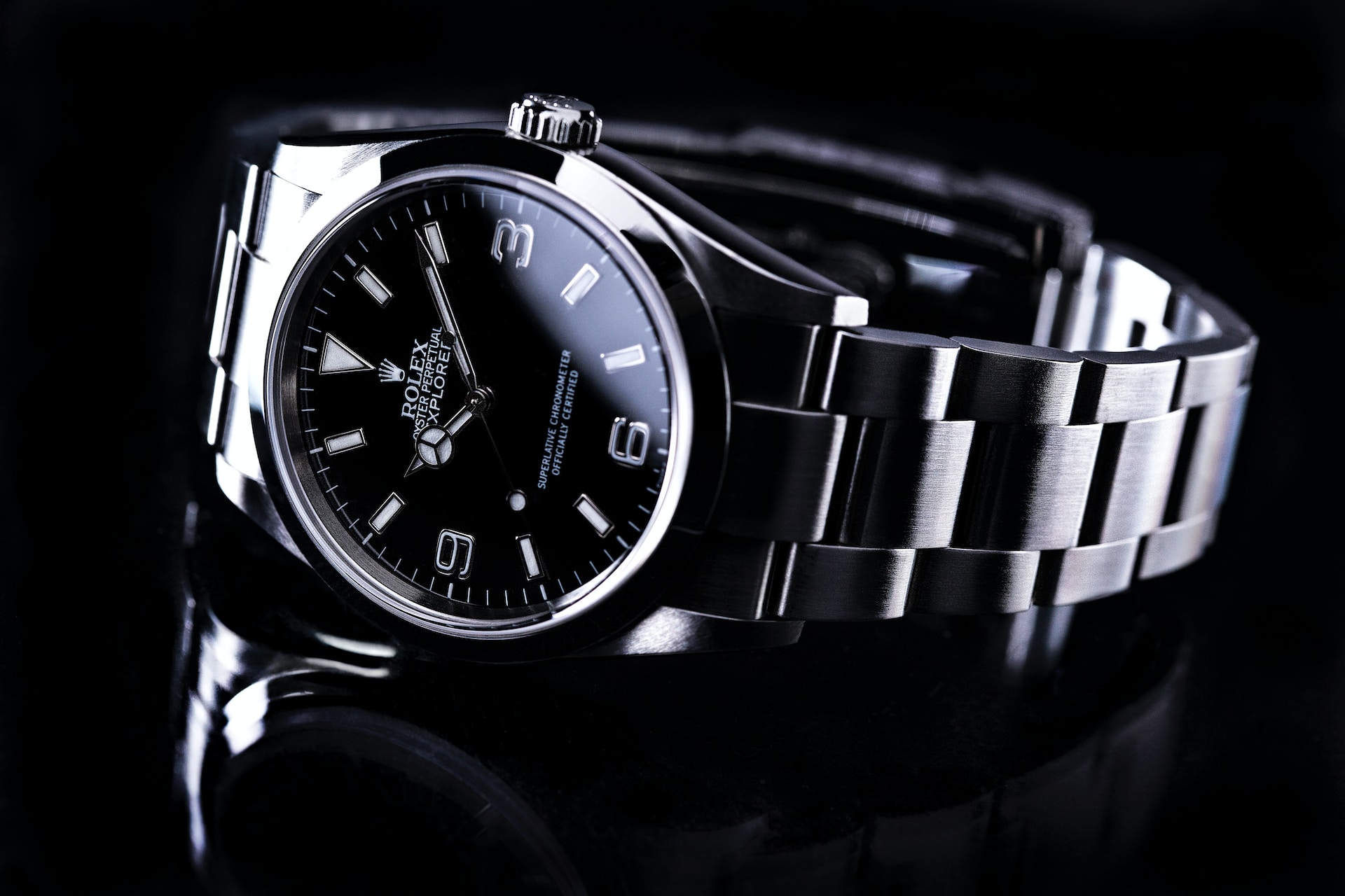 A Rolex watch on its side.