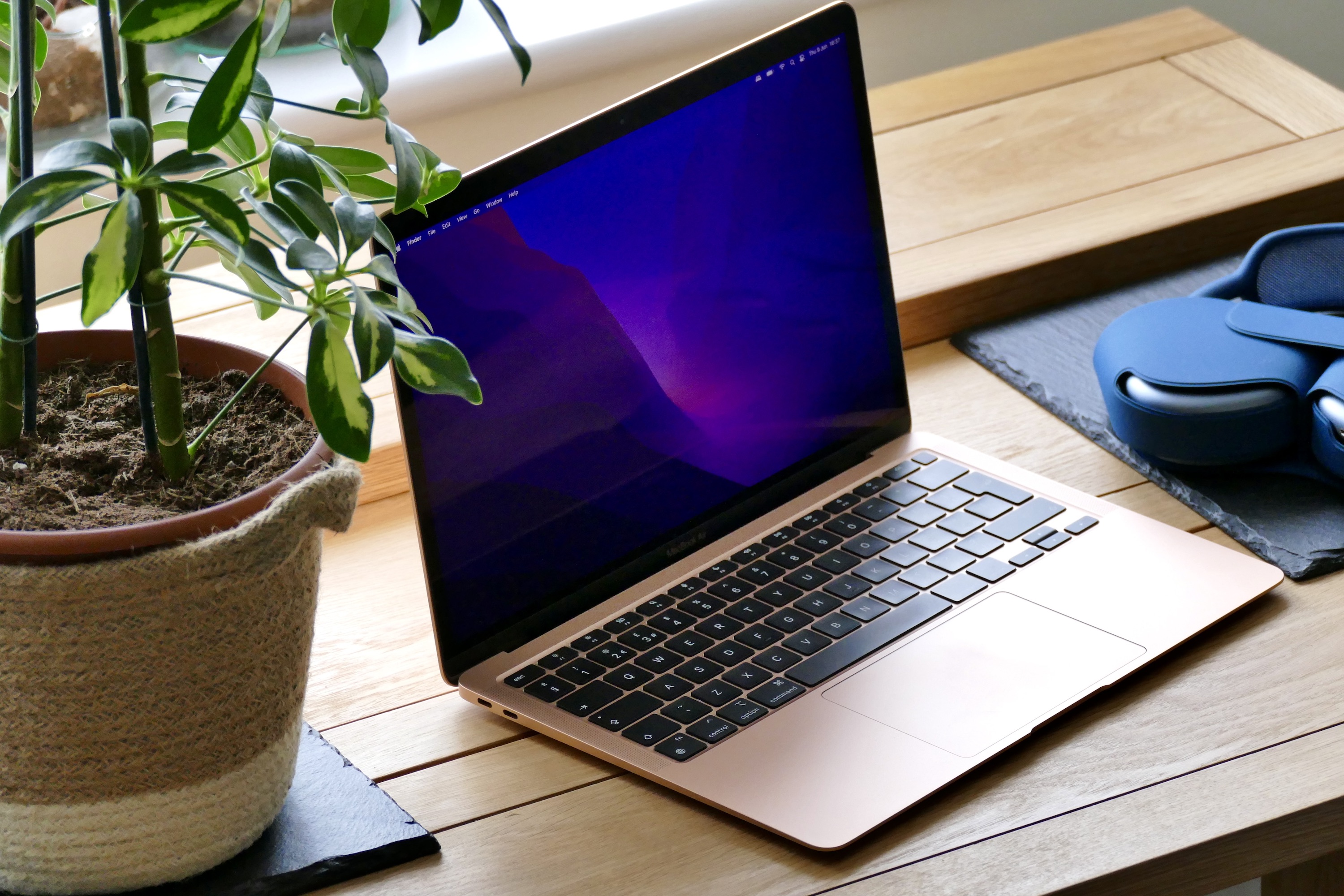 A MacBook Air laptop on a desk.