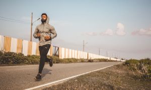 Man jogging on pavement