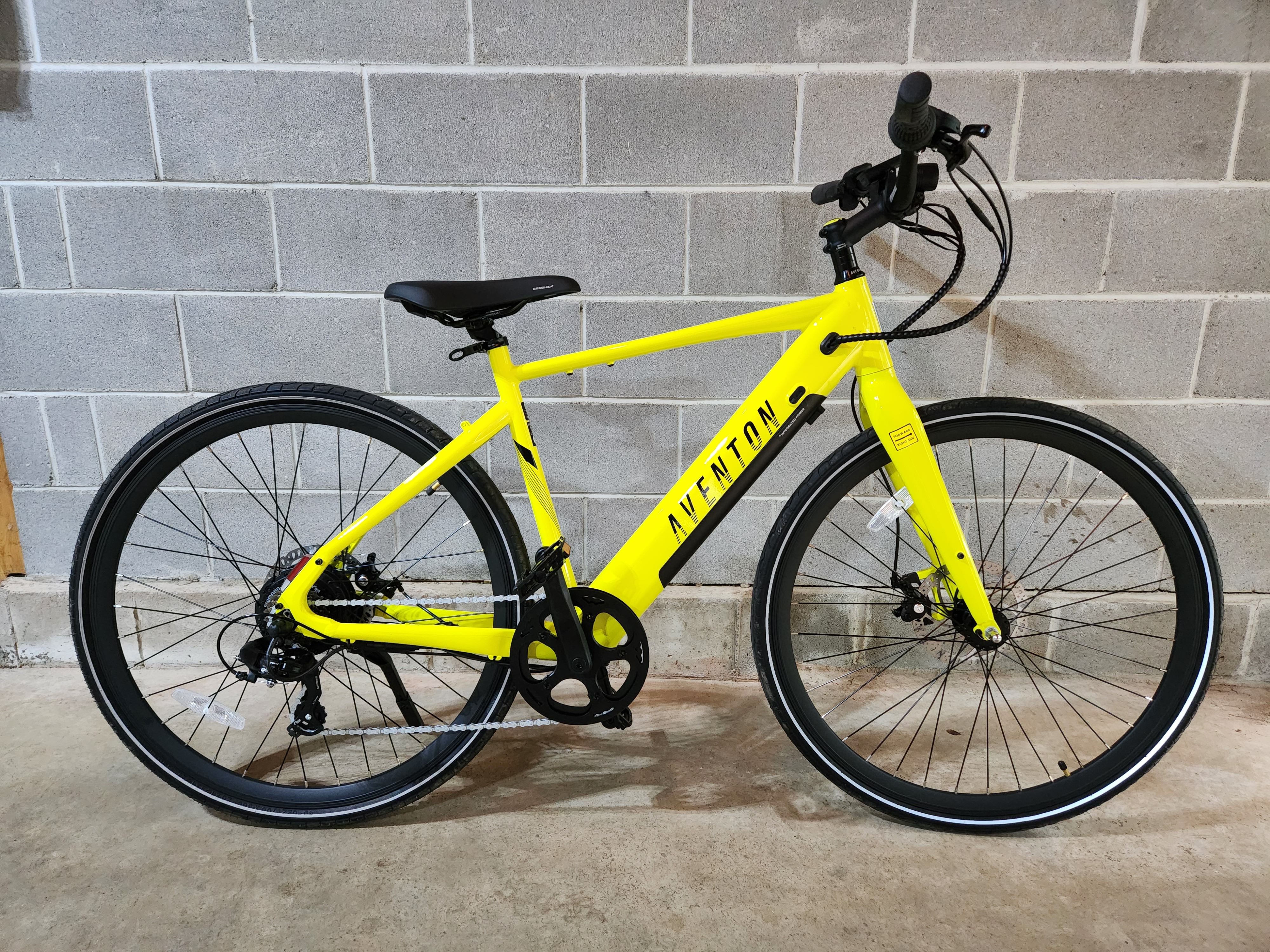 Aventon Soltera.2 parked in front of a concrete wall