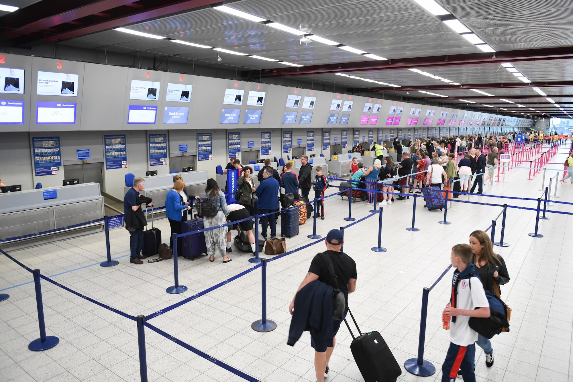 People waiting in line at the airport