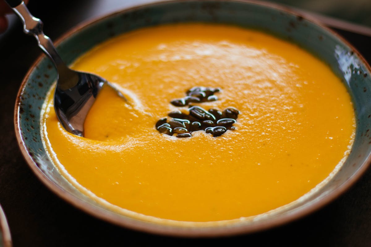 a bowl of butternut squash soup