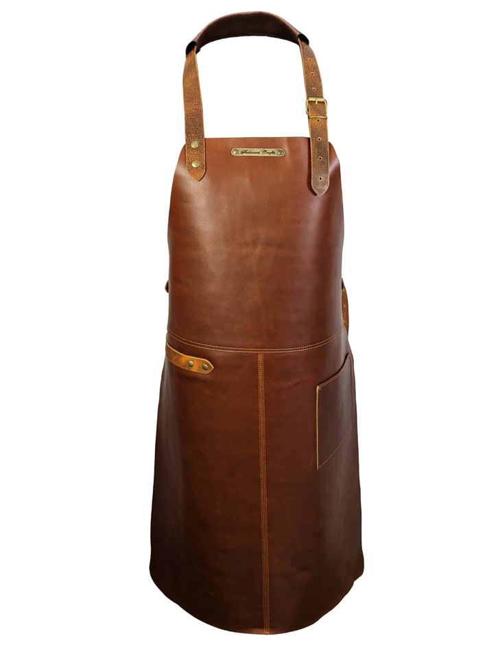 https://www.themanual.com/wp-content/uploads/sites/9/2023/12/stalwart-apron.jpeg?fit=603%2C800&p=1