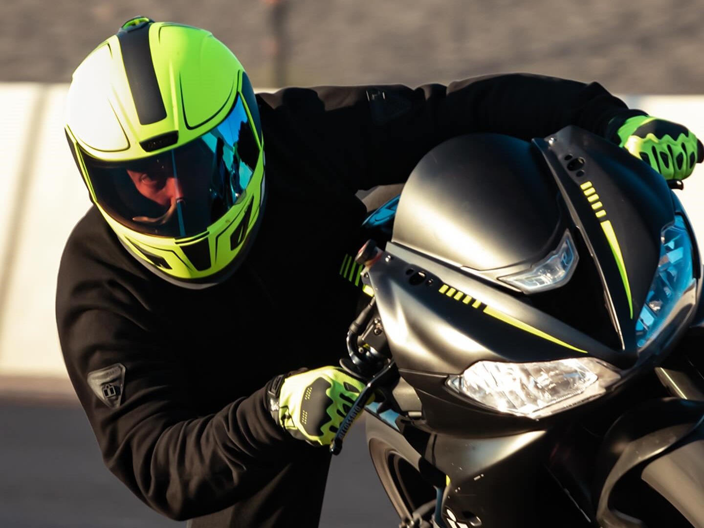 Icon Motorsports helmet worn by rider on the track