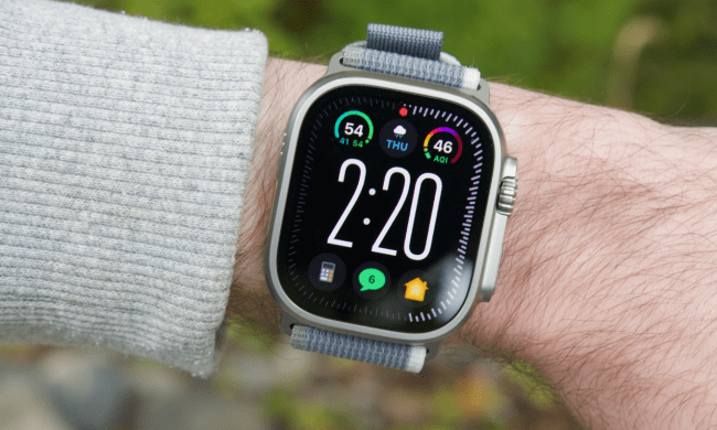 Someone wearing an Apple Watch Ultra 2, showing the Modular Ultra watch face.