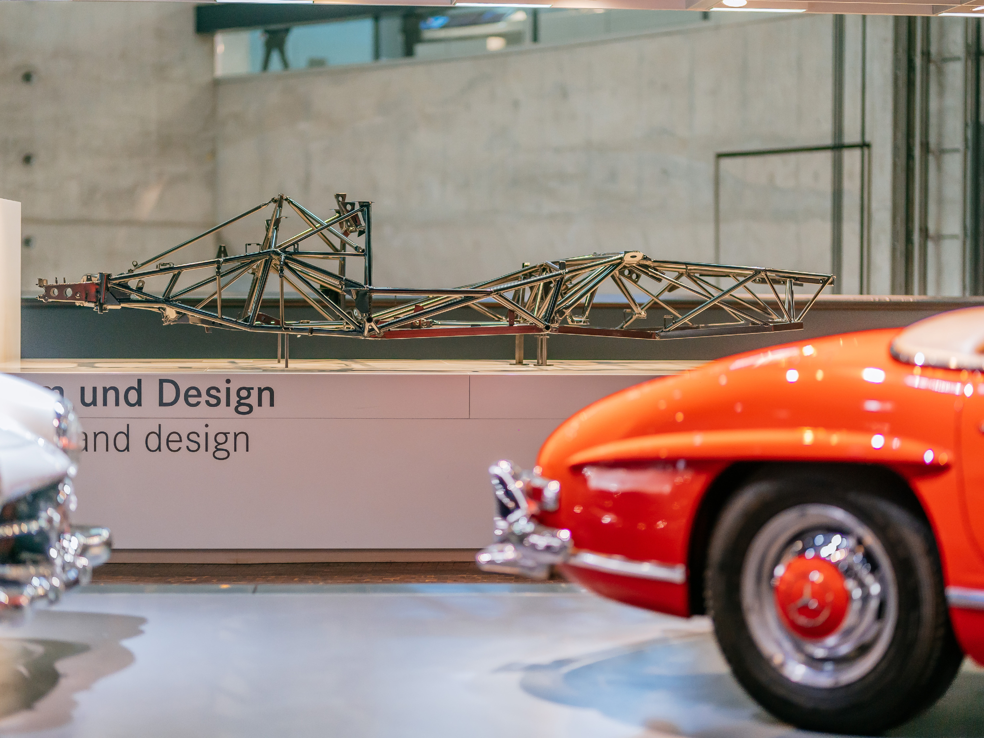 The Mercedes-Benz 300 SL Coupe race car space frame necessitated the gullwing doord - on display at the Mercedes-Benz Museum.