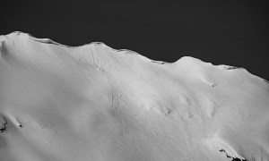 Mountain ridgeline covered in snow