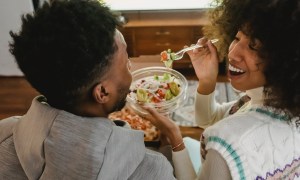 Man and women sharing a meal together