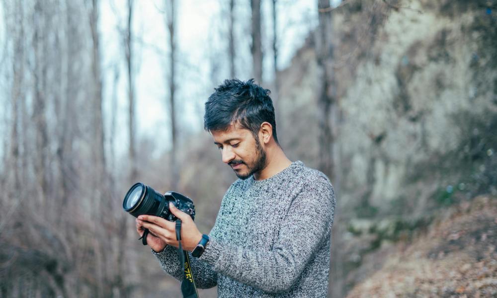 Man wearing tweed sweater