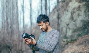 man wearing tweed sweater