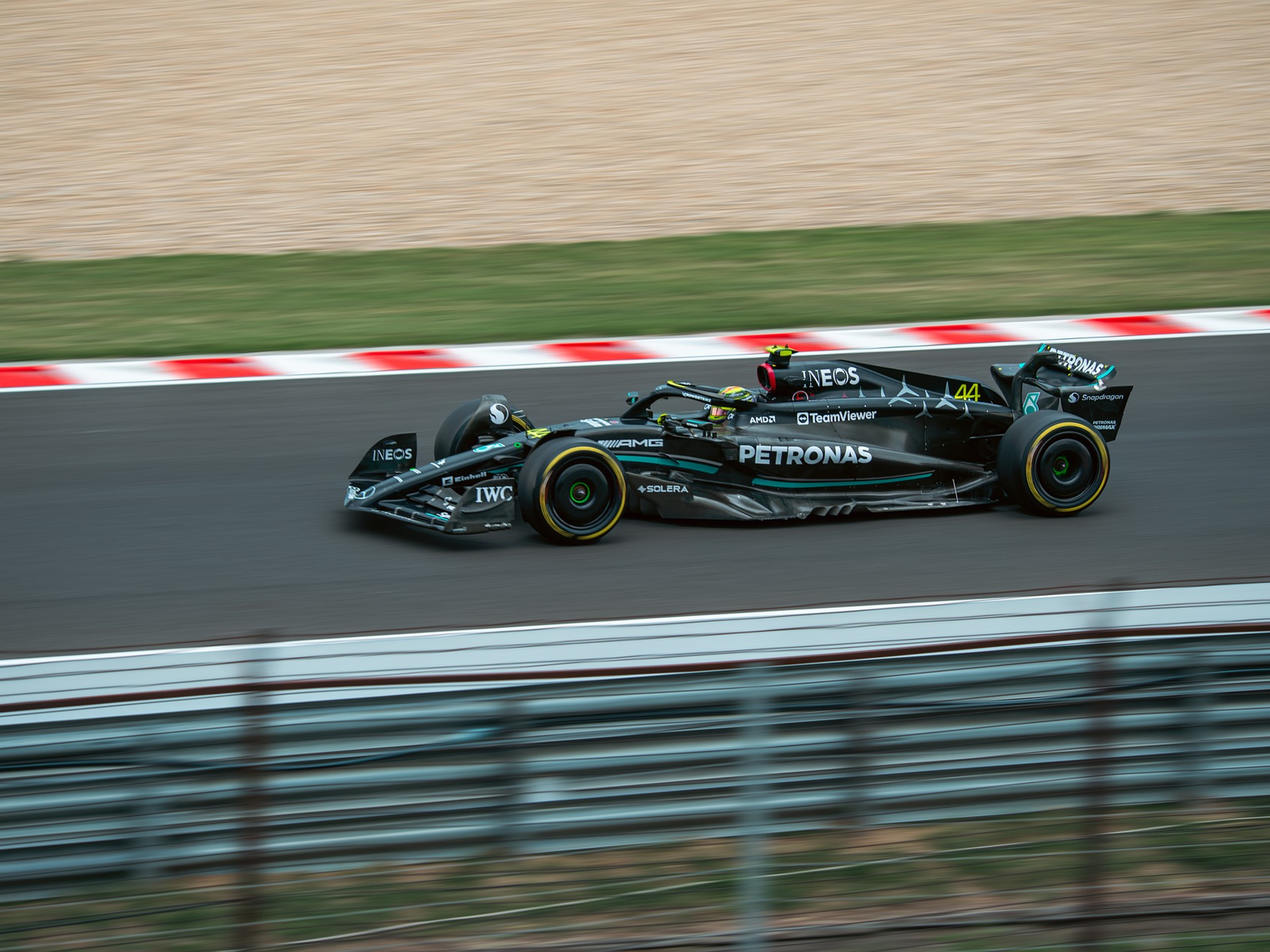 Lewis Hamilton driving a Mercedes AMG Petronas F1 race car.