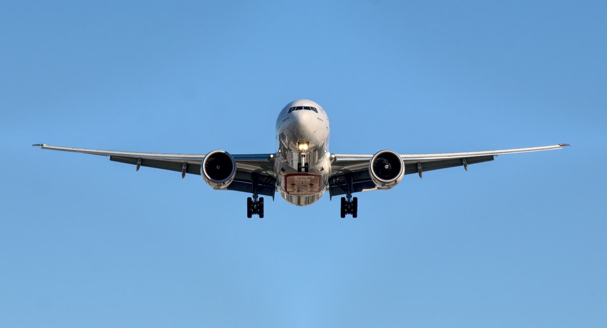 Airplane in mid-air during the day