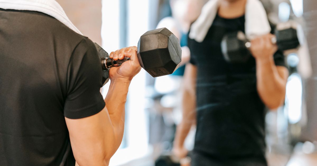 man exercising in mirror