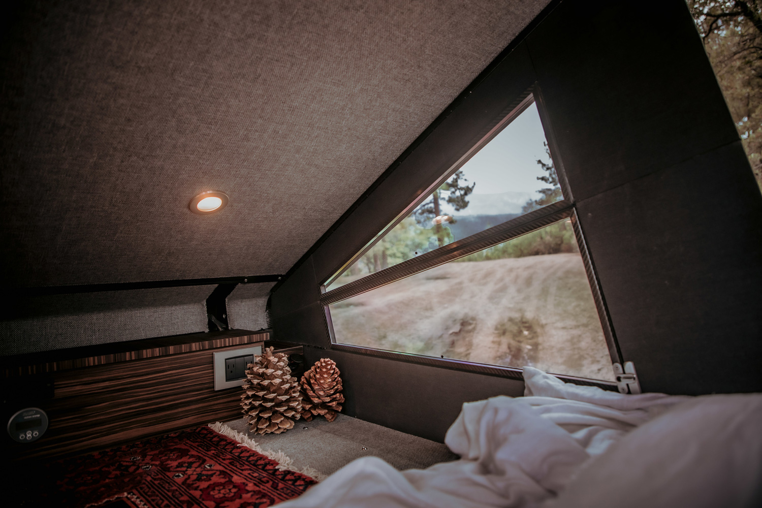 Rooftop master bedroom of Redtail Overland's Skyloft campervan.