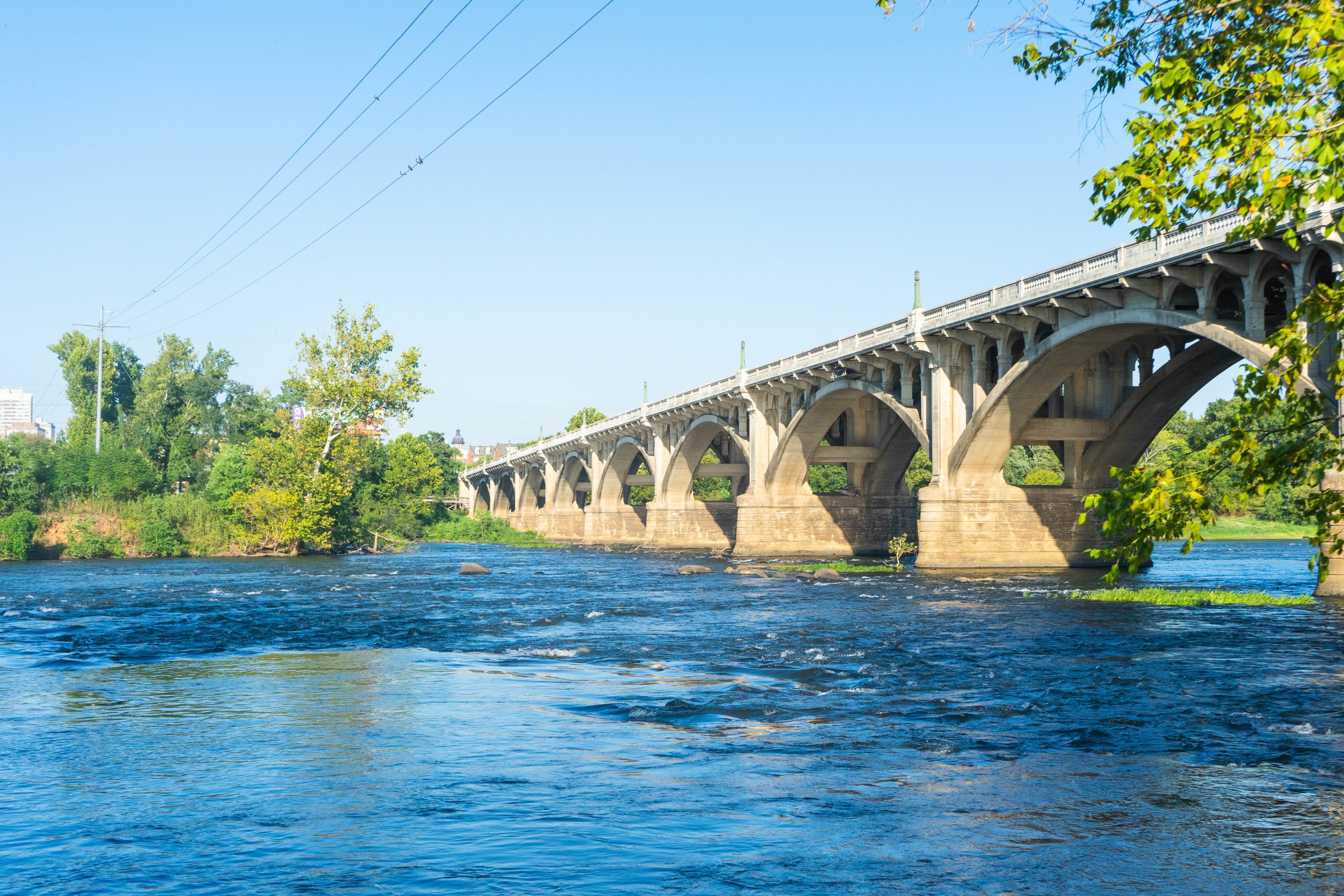 Long bridge for cars and trucks over major riverway in Columbia, South Carolina