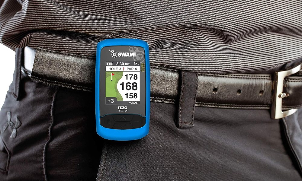 The Izzo Swami 6000 golf GPS device attached to a man's belt.